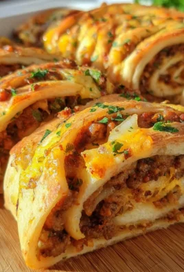 Teig eingerollt mit Hackfleisch