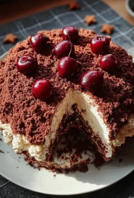 Winterlicher Maulwurfkuchen mit Zimtsahne und Punschkirschen